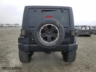 2012 Jeep Wrangler Unlimited Sahara with VIN 1C4HJWEG4CL269873, listed as a Copart auction lot 49000475 with 176,135 mi miles and Clean Title. Bid and sale history available at carsss.com. Image 6.