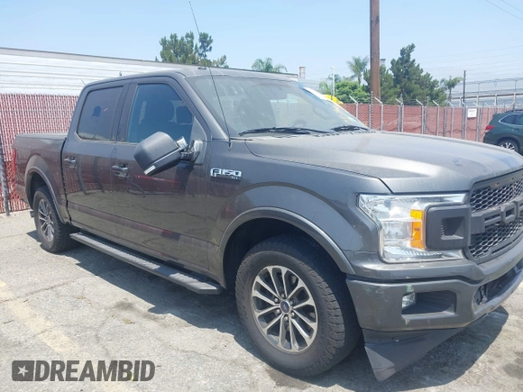 2018 Ford F-150 XL with VIN 1FTEW1CPXJKD56562, listed as a IAAI auction lot 42588371 with 137,496 mi miles and . Bid and sale history available at DreamBid. Image 18.