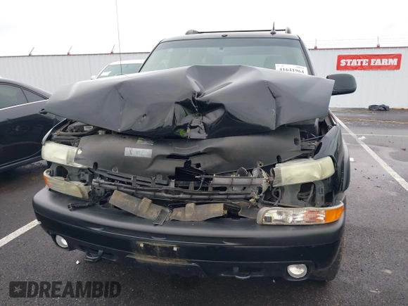 2004 Chevrolet Tahoe Z71 with VIN 1GNEK13T64R210008, listed as a IAAI auction lot 41641964 with 196,780 mi miles and . Bid and sale history available at DreamBid. Image 6.