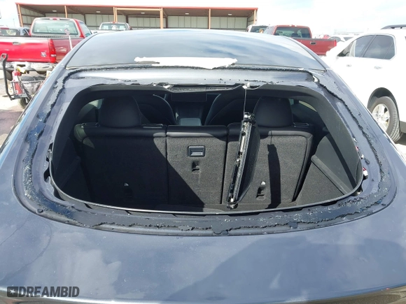 2023 Tesla Model Y Long Range with VIN 7SAYGDEE3PA204992, listed as a IAAI auction lot 41849104 with 22,490 mi miles. Bid and sale history available at carsss.com. Image 6.
