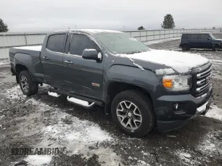 2015 GMC Canyon 4WD SLE with VIN 1GTG6BE33F1115979, listed as a Copart auction lot 41680415 with 155,346 mi miles and Salvage Title. Bid and sale history available at carsss.com. Image 4.