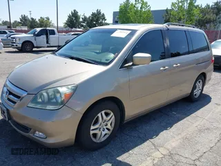 2006 Honda Odyssey EX-L with VIN 5FNRL38646B044795, listed as a IAAI auction lot 42102422 with 213,194 mi miles and . Bid and sale history available at carsss.com. Image 2.