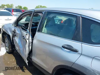 2015 Honda CR-V LX z VIN 2HKRM3H39FH500617, wystawiony jako IAAI lot #42028379 z przebiegiem 97 117 mil mil oraz . Historia ofert i sprzedaży dostępna na DreamBid. Obrazek 14.