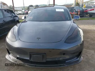 2019 Tesla Model 3 Long Range with VIN 5YJ3E1EB6KF413320, listed as a IAAI auction lot 41760428 with 90,441 mi miles and . Bid and sale history available at DreamBid. Image 11.