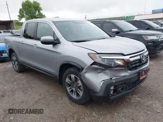 2018 Honda Ridgeline RTL with VIN 5FPYK3F52JB002649, listed as a IAAI auction lot 42338360 with 68,802 mi miles and . Bid and sale history available at DreamBid. Image 1.