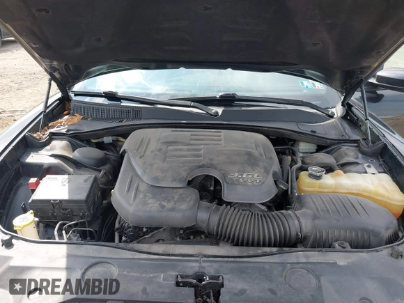 2014 Dodge Charger SXT Plus with VIN 2C3CDXJG2EH184239, listed as a IAAI auction lot 41912384 with 128,313 mi miles. Bid and sale history available at carsss.com. Image 10.