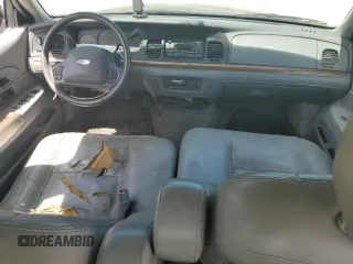2004 Ford Crown Victoria LX z VIN 2FAFP74W14X130606, wystawiony jako Copart lot #54120085 z przebiegiem 221 700 mil mil oraz Szkody całkowita. Historia ofert i sprzedaży dostępna na DreamBid. Obrazek 8.