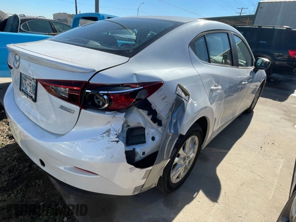 2014 Mazda 3 i Touring with VIN JM1BM1V78E1114550, listed as a Copart auction lot 57202185 with 100,722 mi miles and Clean Title. Bid and sale history available at DreamBid. Image 4.