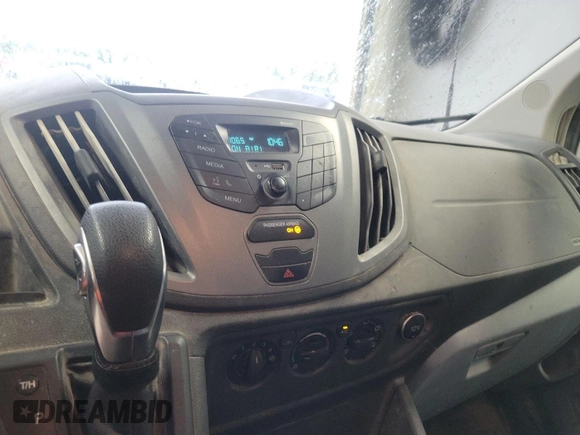 2019 Ford Transit with VIN 1FTYE1ZM6KKA31079, listed as a IAAI auction lot 42906716 with 169,160 mi miles and . Bid and sale history available at DreamBid. Image 12.