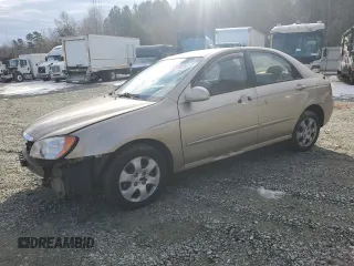 2004 Kia Spectra LX with VIN KNAFE121445056245, listed as a Copart auction lot 88202625 with 257,179 mi miles and Salvage Title. Bid and sale history available at carsss.com. Image 1.