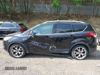 2016 Ford Escape Titanium with VIN 1FMCU9JX1GUC18335, listed as a IAAI auction lot 42396492 with 147,522 mi miles and . Bid and sale history available at DreamBid. Image 14.