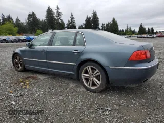 2005 Volkswagen Phaeton z VIN WVWAF03D758003746, wystawiony jako Copart lot #57449525 z przebiegiem 177 257 mil mil oraz Szkoda całkowita • Salvage title. Historia ofert i sprzedaży dostępna na DreamBid. Obrazek 2.