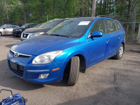 2010 Hyundai Elantra Touring SE with VIN KMHDC8AE0AU052512, listed as a IAAI auction lot 42123818 with 243,070 mi miles. Bid and sale history available at carsss.com. Image 2.