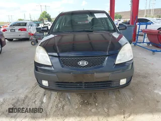 2009 Kia Rio LX with VIN KNADE223496561265, listed as a IAAI auction lot 42143889 with 235,634 mi miles and . Bid and sale history available at DreamBid. Image 6.