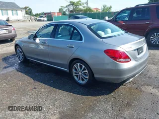 2016 Mercedes-Benz C 300 with VIN 55SWF4JB7GU162041, listed as a IAAI auction lot 42615333 with 39,714 mi miles and . Bid and sale history available at DreamBid. Image 3.