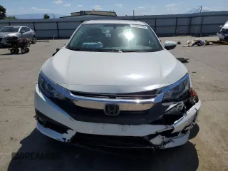 2018 Honda Civic EX-L z VIN JHMFC1F77JX016165, wystawiony jako Copart lot #56885445 z przebiegiem Nie podano mil oraz Szkoda całkowita • Salvage title. Historia ofert i sprzedaży dostępna na DreamBid. Obrazek 5.