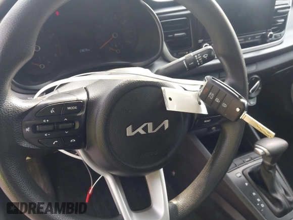 2023 Kia Rio LX with VIN 3KPA24AD8PE554153, listed as a IAAI auction lot 41710165 with 23,879 mi miles. Bid and sale history available at carsss.com. Image 11.