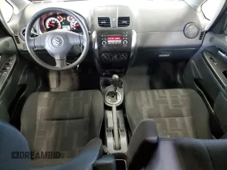 2010 Suzuki SX4 z VIN JS2YB5A36A6300326, wystawiony jako Copart lot #84372804 z przebiegiem 51 036 mil mil oraz Tytuł czysty. Historia ofert i sprzedaży dostępna na DreamBid. Obrazek 8.