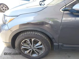 2021 Honda CR-V EX z VIN 2HKRW1H5XMH407361, wystawiony jako IAAI lot #42406157 z przebiegiem 51 493 mil mil oraz . Historia ofert i sprzedaży dostępna na DreamBid. Obrazek 18.