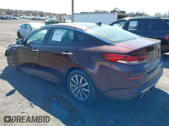 2019 Kia Optima EX with VIN 5XXGU4L12KG292041, listed as a IAAI auction lot 42065738 with 74,222 mi miles and . Bid and sale history available at carsss.com. Image 3.