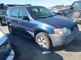 2003 Ford Escape XLS Popular with VIN 1FMYU02133KA02990, listed as a IAAI auction lot 41803174 with 140,792 mi miles. Bid and sale history available at carsss.com. Image 1.