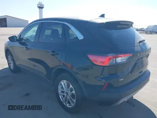 2022 Ford Escape SE z VIN 1FMCU9G6XNUB30881, wystawiony jako IAAI lot #41750512 z przebiegiem 88 681 mil mil oraz . Historia ofert i sprzedaży dostępna na DreamBid. Obrazek 3.