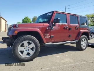 2008 Jeep Wrangler Unlimited Sahara with VIN 1J4GA59168L534967, listed as a Copart auction lot 54894635 with 180,581 mi miles and Salvage title. Bid and sale history available at DreamBid. Image 1.