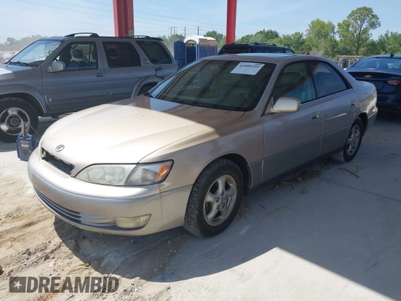1999 Lexus ES 300 Luxury Sport Sdn with VIN JT8BF28G0X5065317, listed as a IAAI auction lot 42080216 with 163,223 mi miles. Bid and sale history available at carsss.com. Image 2.