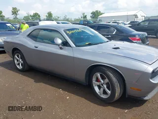 2013 Dodge Challenger SXT с VIN 2C3CDYAG7DH675121, выставлен на аукционе IAAI как лот 42623166 с пробегом 189 604 миль миль и . История ставок и продаж доступна на DreamBid. Изображение 1.