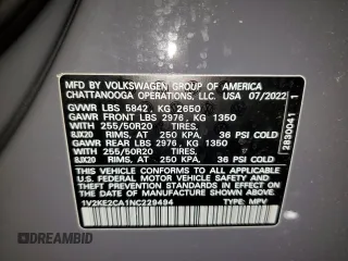 2022 Volkswagen Atlas SE z VIN 1V2KE2CA1NC229494, wystawiony jako Copart lot #42028205 z przebiegiem 54 046 mil mil oraz Czysty tytuł • Clean title. Historia ofert i sprzedaży dostępna na DreamBid. Obrazek 13.