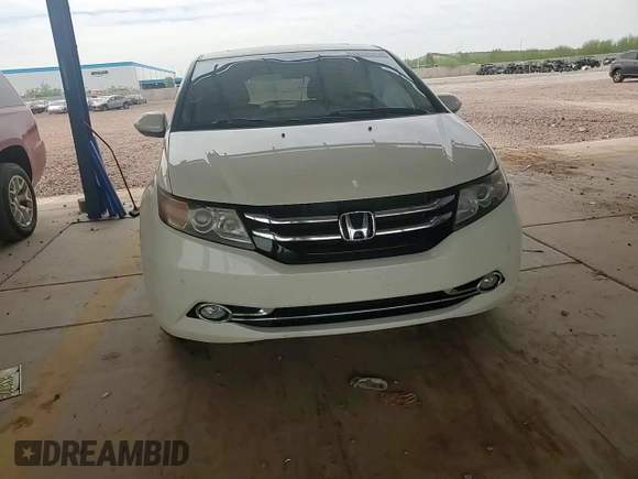 2017 Honda Odyssey Touring with VIN 5FNRL5H94HB007979, listed as a Copart auction lot 56755435 with 125,821 mi miles and Salvage title. Bid and sale history available at DreamBid. Image 14.