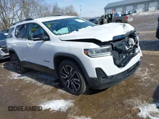 2021 GMC Acadia SLT with VIN 1GKKNMLS2MZ163379, listed as a IAAI auction lot 41614025 with 61,232 mi miles. Bid and sale history available at carsss.com. Image 1.