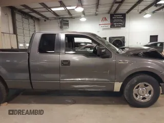 2005 Ford F-150 STX with VIN 1FTRX12W95NB38107, listed as a IAAI auction lot 41185100 with 201,171 mi miles. Bid and sale history available at carsss.com. Image 13.
