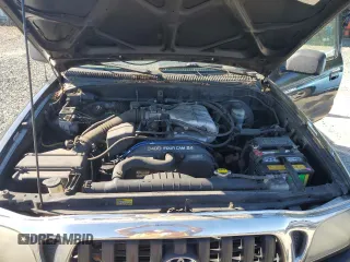 2004 Toyota Tacoma z VIN 5TEWN72N74Z389013, wystawiony jako Copart lot #55796005 z przebiegiem 199 637 mil mil oraz Czysty tytuł • Clean title. Historia ofert i sprzedaży dostępna na DreamBid. Obrazek 11.