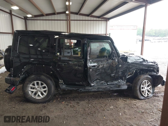 2023 Jeep Wrangler Willys with VIN 1C4HJXDG0PW617101, listed as a IAAI auction lot 42111687 with 56,415 mi miles and . Bid and sale history available at DreamBid. Image 14.