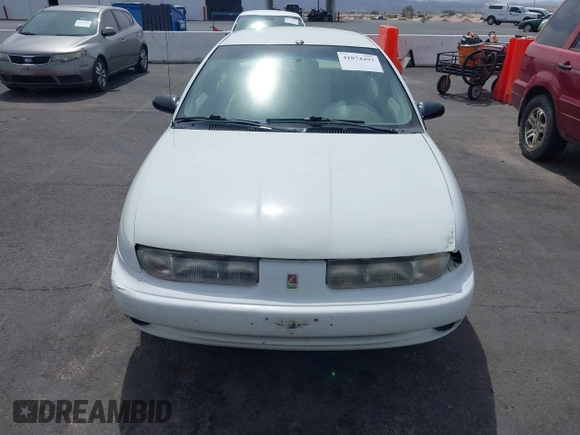 1998 Saturn SL z VIN 1G8ZJ5272WZ312413, wystawiony jako IAAI lot #41874493 z przebiegiem 229 200 mil mil oraz . Historia ofert i sprzedaży dostępna na DreamBid. Obrazek 6.