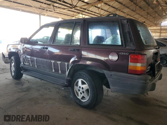 1995 Jeep Grand Cherokee Laredo with VIN 1J4GZ58S1SC704775, listed as a Copart auction lot 87556535 with 266,365 mi miles and Salvage title. Bid and sale history available at DreamBid. Image 2.