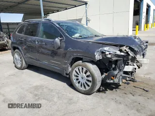 2015 Jeep Cherokee Limited with VIN 1C4PJLDS5FW607865, listed as a Copart auction lot 52909185 with 101,472 mi miles and Clean Title. Bid and sale history available at DreamBid. Image 4.