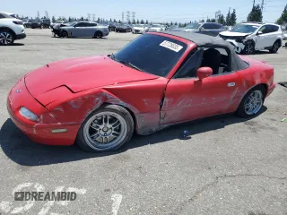 1996 Mazda MX-5 Miata z VIN JM1NA3539T0714320, wystawiony jako Copart lot #57728035 z przebiegiem 82 488 mil mil oraz Szkoda całkowita • Salvage title. Historia ofert i sprzedaży dostępna na DreamBid. Obrazek 1.