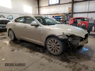 2009 Jaguar XF with VIN SAJXA06B19HR29408, listed as a Copart auction lot 88125085 with 160,152 mi miles and Salvage Title. Bid and sale history available at DreamBid. Image 4.