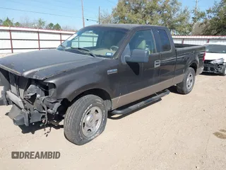 2005 Ford F-150 XLT with VIN 1FTPX12585NA67903, listed as a IAAI auction lot 41856821 with 174,847 mi miles. Bid and sale history available at carsss.com. Image 2.