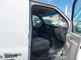 2016 Chevrolet Express Cargo Van with VIN 1GCWGBFF6G1154276, listed as a IAAI auction lot 41523966 with 70,558 mi miles. Bid and sale history available at carsss.com. Image 5.
