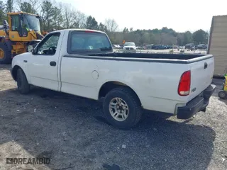 1999 Ford F-150 Work Series with VIN 1FTZF1726XNB58407, listed as a IAAI auction lot 41753826 with 180,172 mi miles. Bid and sale history available at carsss.com. Image 3.