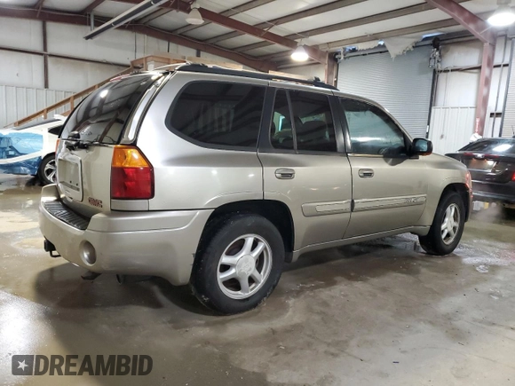 2002 GMC Envoy SLE with VIN 1GKDS13S622135607, listed as a Copart auction lot 84100254 with 298,811 mi miles and Salvage Title. Bid and sale history available at carsss.com. Image 3.