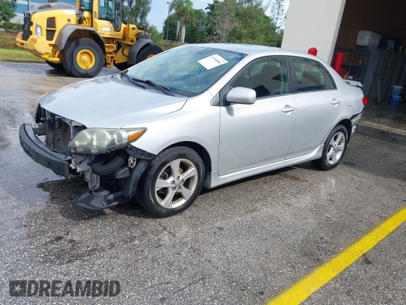 2013 Toyota Corolla L with VIN 5YFBU4EE7DP209207, listed as a IAAI auction lot 41990086 with 168,269 mi miles. Bid and sale history available at carsss.com. Image 2.