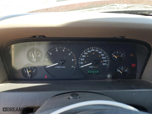 2004 Jeep Grand Cherokee Laredo with VIN 1J4GW48N84C311923, listed as a Copart auction lot 52144535 with 231,069 mi miles and Salvage Title. Bid and sale history available at carsss.com. Image 9.