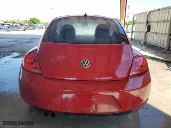 2012 Volkswagen Beetle 2.5L with VIN 3VWJX7AT7CM662822, listed as a Copart auction lot 74215804 with 115,890 mi miles and Salvage Title. Bid and sale history available at carsss.com. Image 6.