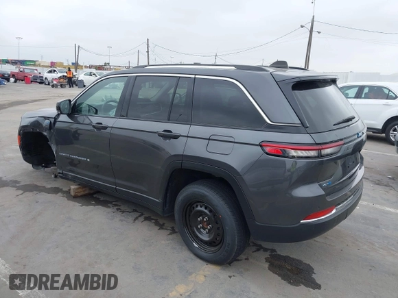 2022 Jeep Grand Cherokee with VIN 1C4RJYB68N8748802, listed as a IAAI auction lot 42158104 with 28,227 mi miles and . Bid and sale history available at DreamBid. Image 3.