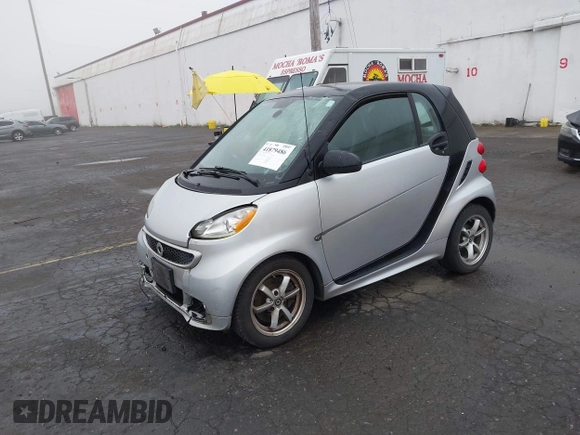2015 Smart fortwo Passion with VIN WMEEJ3BA9FK819985, listed as a IAAI auction lot 41879486 with 79,394 mi miles. Bid and sale history available at carsss.com. Image 17.