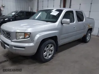 2006 Honda Ridgeline RTL with VIN 2HJYK16546H520899, listed as a IAAI auction lot 41899874 with 3,202,741 mi miles. Bid and sale history available at carsss.com. Image 2.